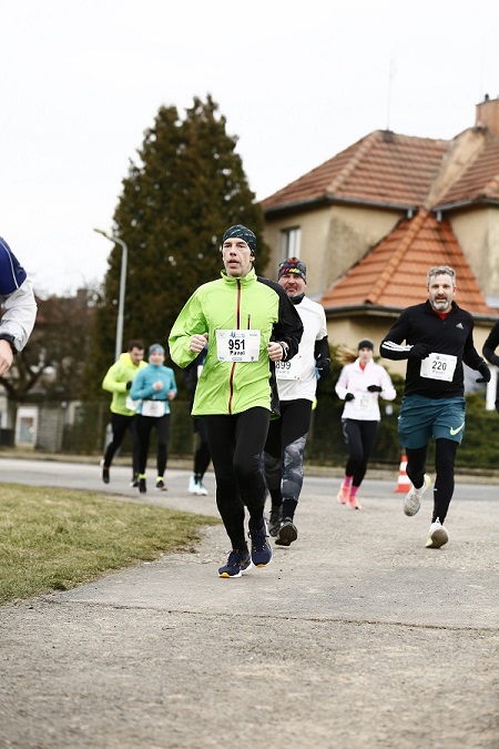 A group of people running on a road

Description automatically generated with medium confidence